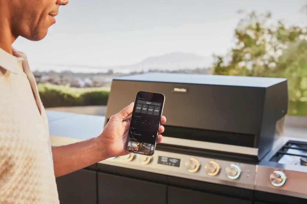 Per Miele App aus der Ferne steuern und CookAssist-Parameter an den Grill senden.